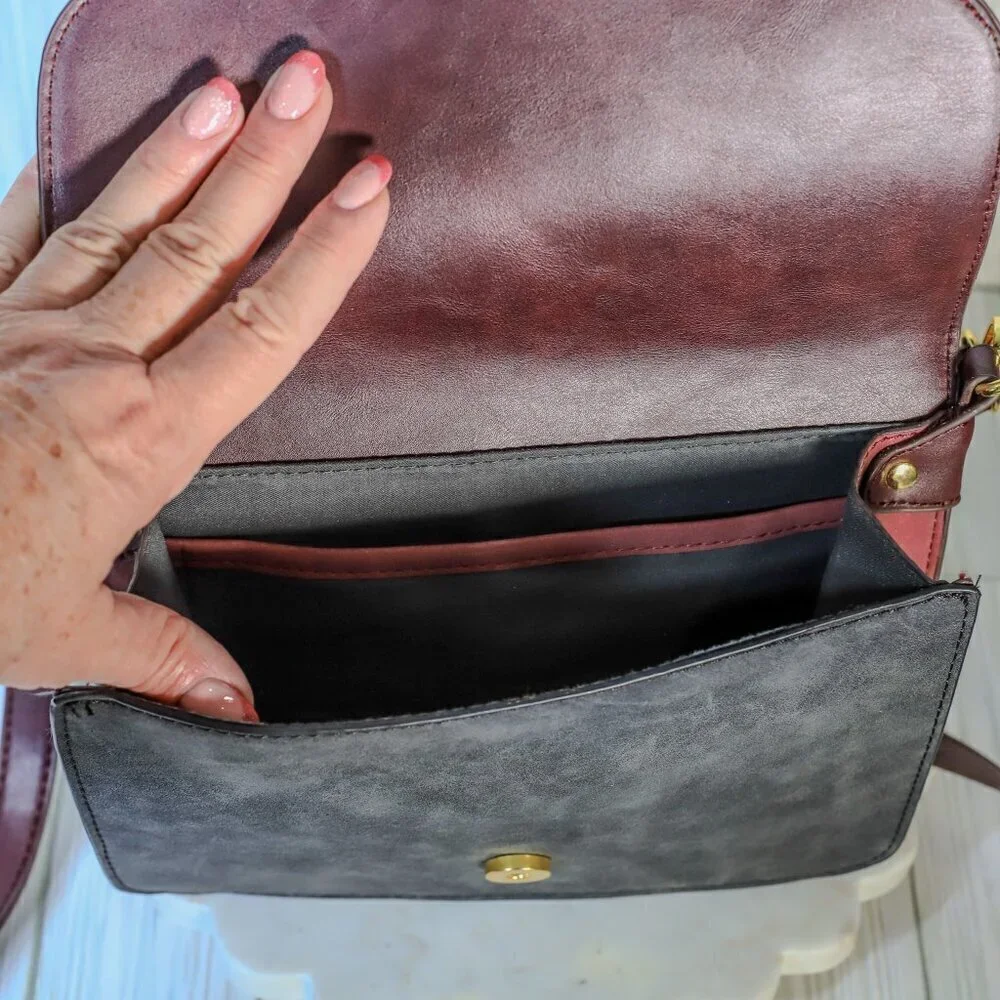 Adrienne Vittadino black/red leather flap top adjustable strap purse
